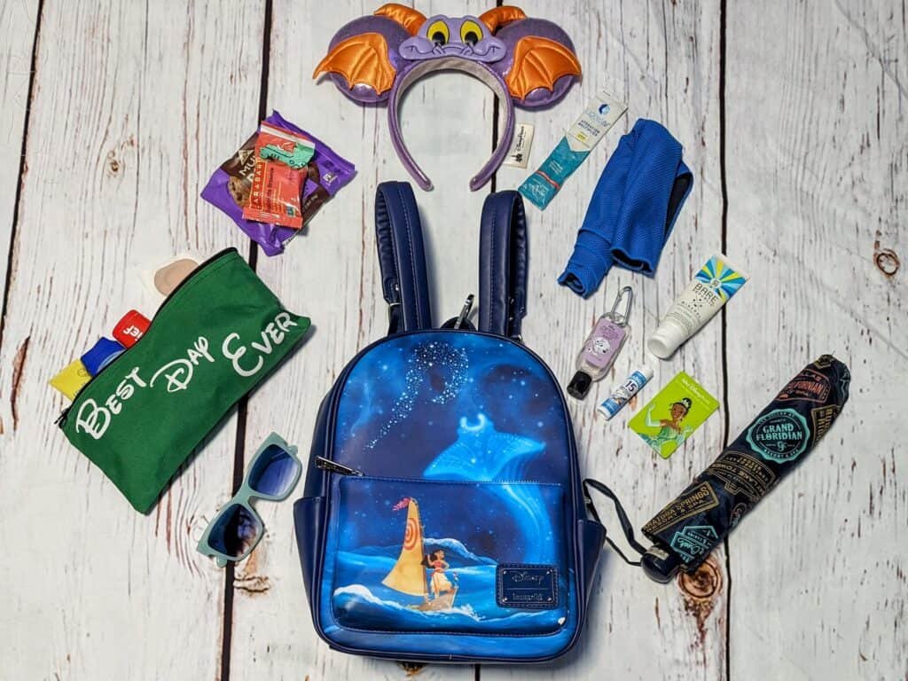 Picture of Moana Disney Parks Loungefly Backpack with supplies for day at the Disney Park