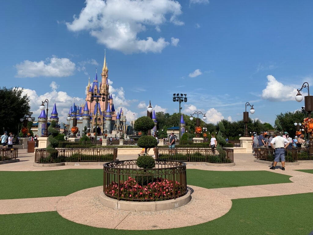 Magic Kingdom Cinderella Castle Hub Grass Disney Packing Tips