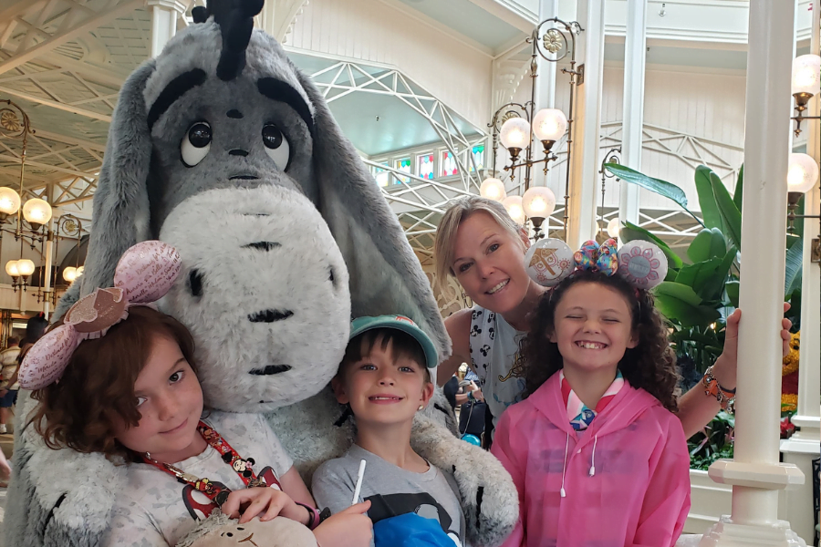 Disney Character Meals on the Disney Dining Plan. Eeyore and kids at Crystal Palace