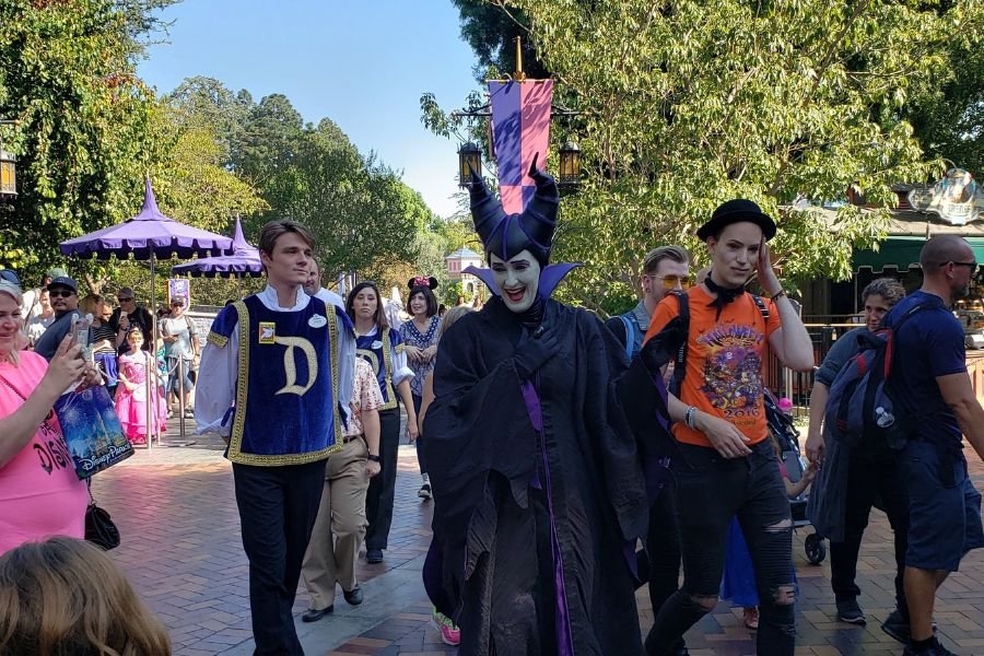 Maleficent in Disneyland walking in the crowd