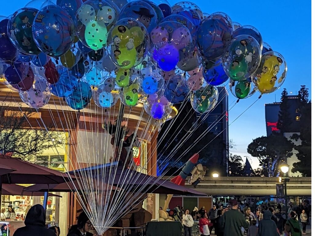 Disneyland in November balloons at night downtown disney